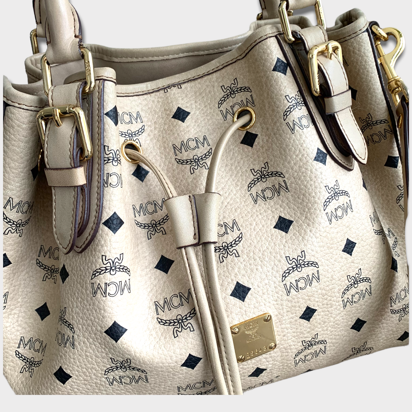 MCM bucket bag beige Visetos gold hardware