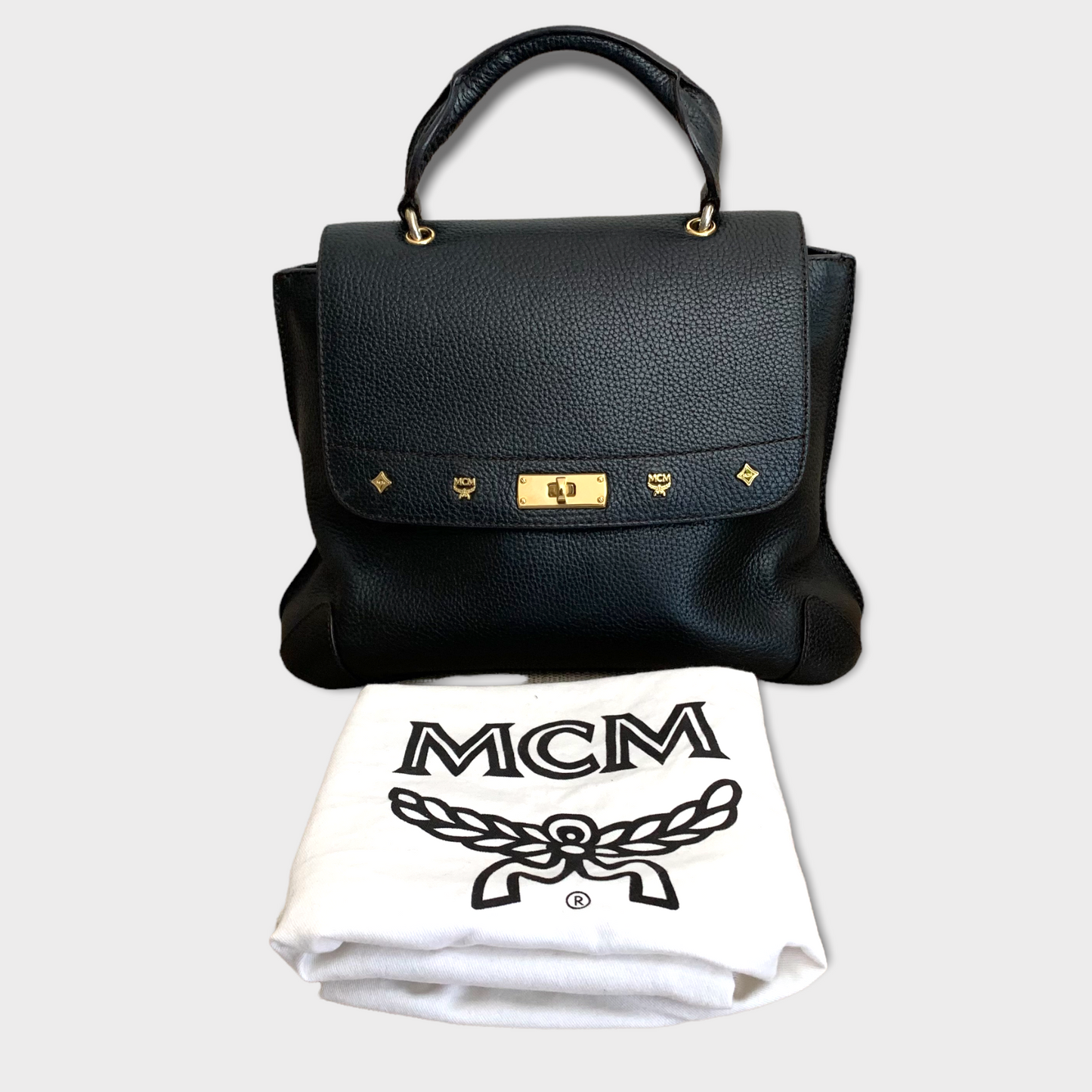 Sac à main en cuir MCM matériel doré noir