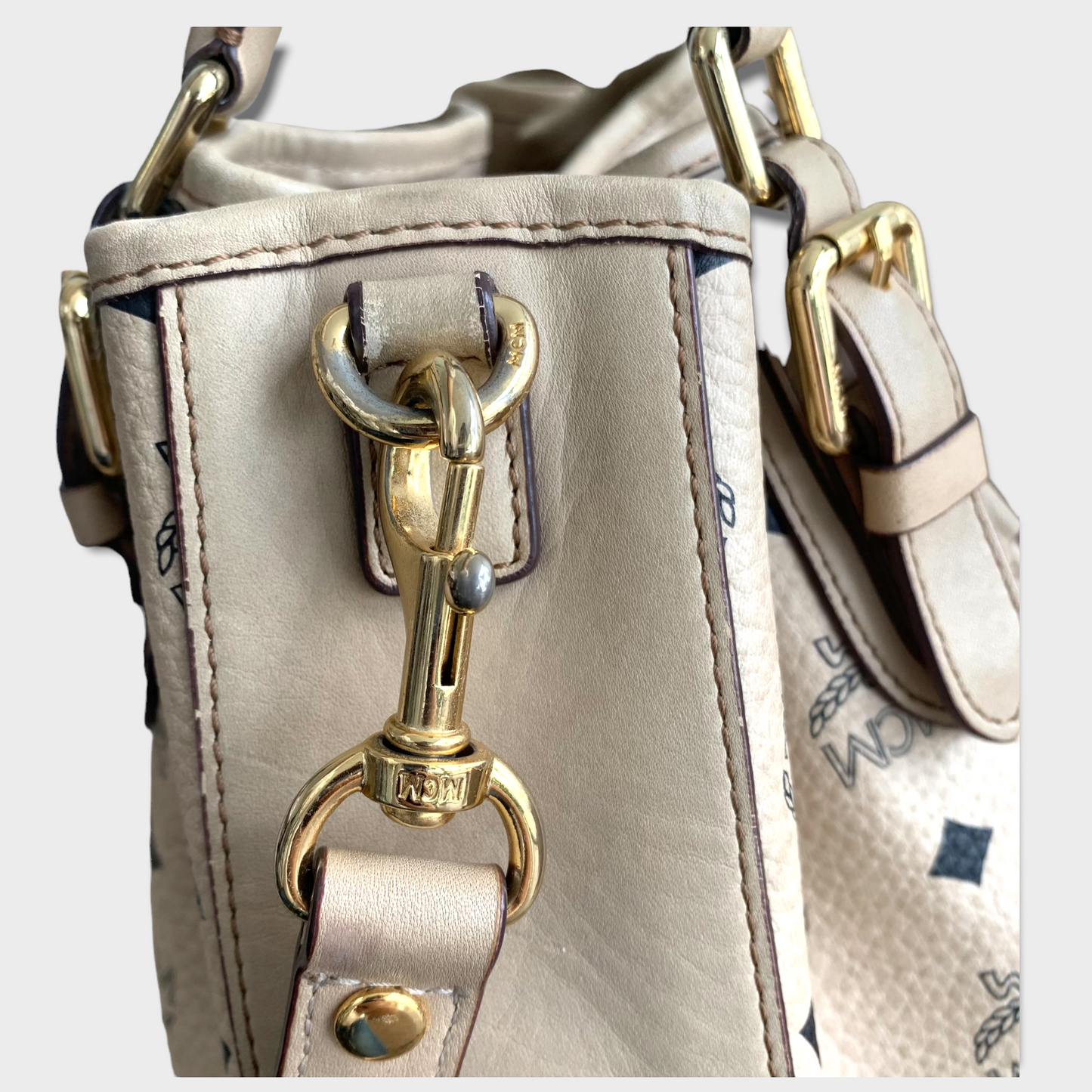 MCM bucket bag beige Visetos gold hardware