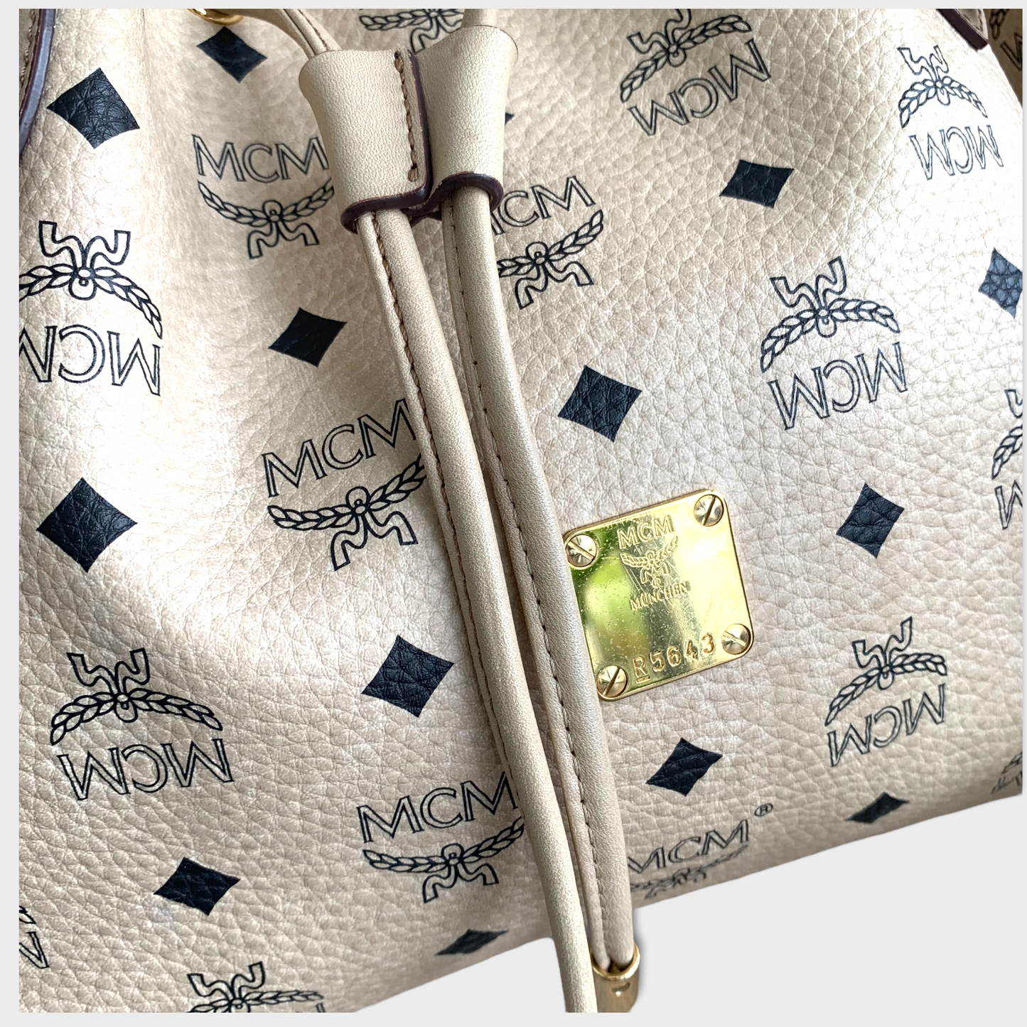 MCM bucket bag beige Visetos gold hardware